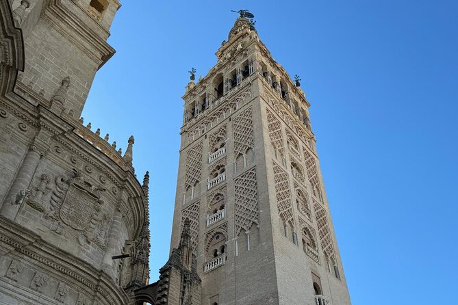 Cathedral Tour of Seville Giralda and Barrio Santa Cruz All in One - Stop 1: Barrio Santa Cruz Streets, Squares, and Courtyards