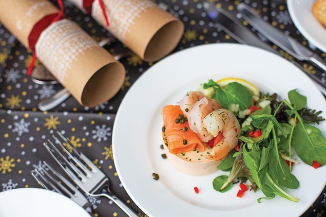 Christmas Day Traditional Lunch Cruise - The vibe onboard: holiday décor, carols, and a warm ride