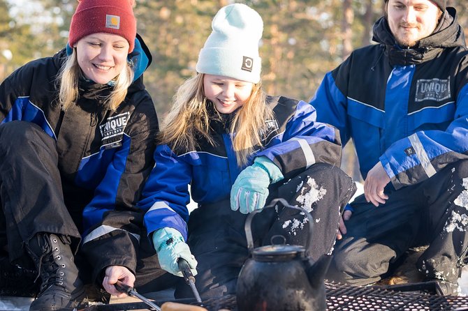 Family Snowmobile Safari from Santa Claus Village - Kids ride in a sleigh, then test a mini-snowmobile