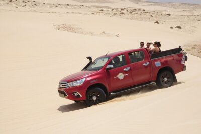 Half Day 4x4 Trip - Dunes, Caves, Santa Monica Beach & Village - Praia da Varandinha caves: exploring the west-side volcanic side of Boavista