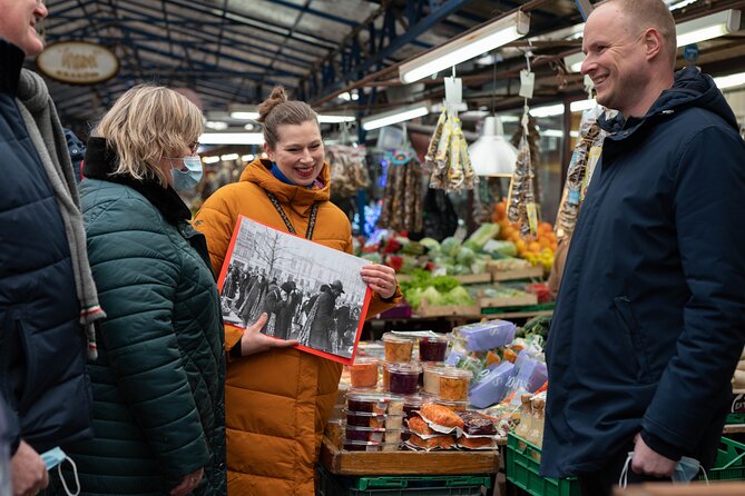 Krakow Christmas Market Immersive Tour - Ulica Florianska: gifts, butchers, toy shops, and Christmas Eve cooking