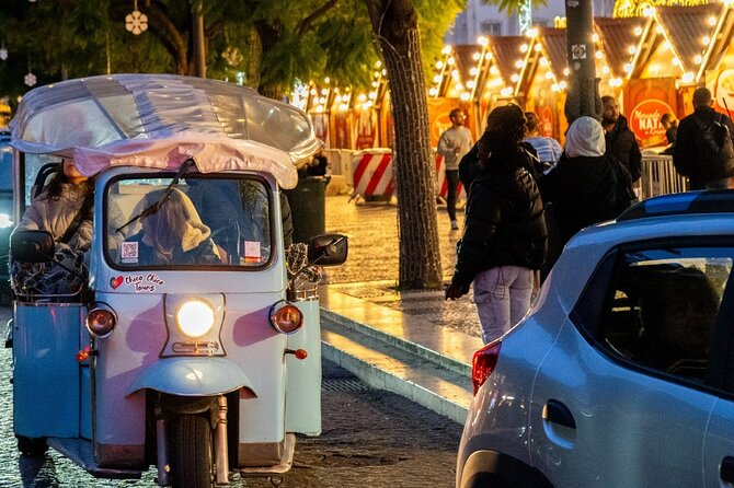 Lisbon Christmas Lights Tuk-Tuk Tour with Local Guide - Rossio Square Christmas Market: Crafts, Food Smells, and a Built-In Atmosphere