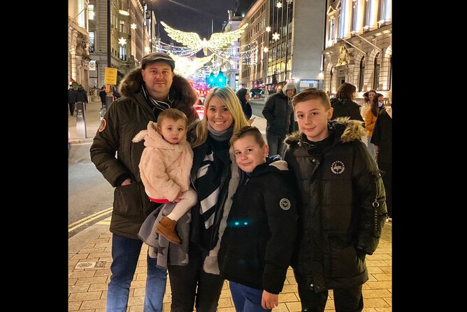 London Christmas Lights Guided Tour by Cab - Stop 2: Regent Street, classic storefront glow