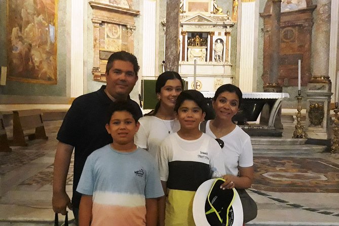 Rome Walking Tour of Holy Sites: Basilica of the Holy Cross in Jerusalem, San Giovanni in Laterano and Scala Santa - Meet in Piazza San Giovanni: How the Walk Stays Focused