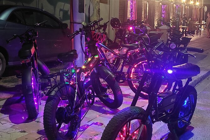 Semi-Private Christmas Edition Twilight Glow E-Bike Oranjestad - Entering Plaza Turismo: a short ticketed stop with local atmosphere