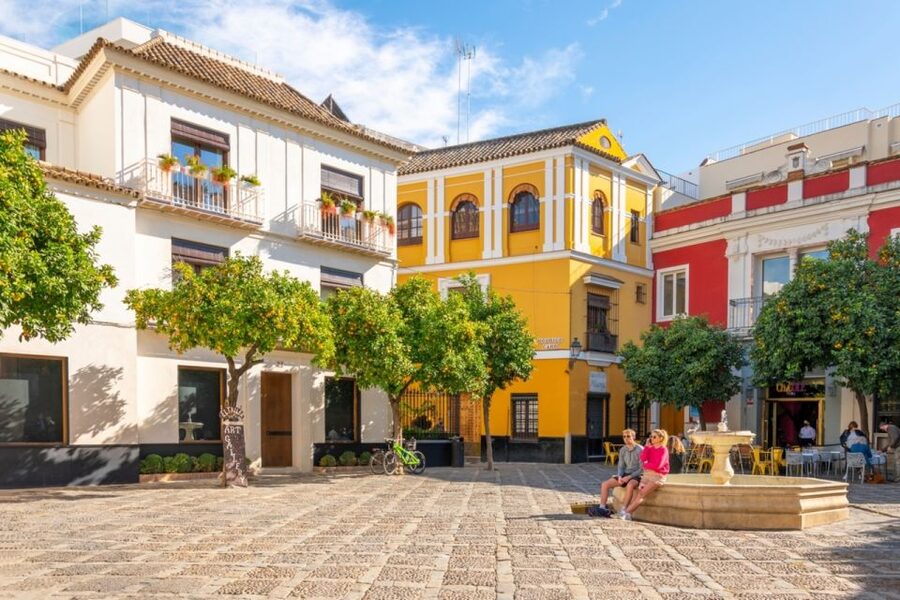 Seville: Barrio de Santa Cruz Small Group Walking Tour - Meeting at Plaza del Triunfo: the orange umbrella moment