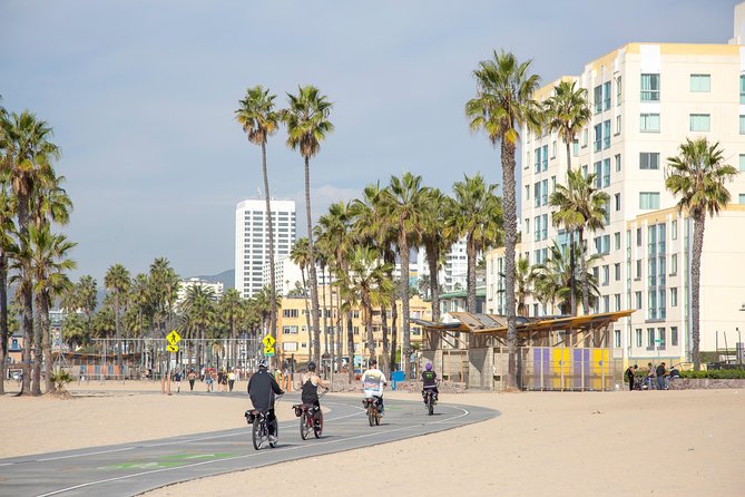 Small-Group Electric Bike Tour of Santa Monica and Venice - Enter Venice Beach: canals, crowds, and the funhouse energy