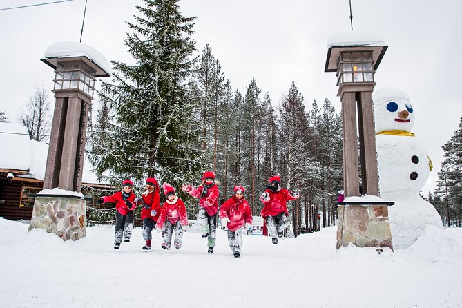 Trip to Arctic Circle, Santa Claus Village and Santas Reindeer - Snowmobile Museum and the Reindeer Photo Moment